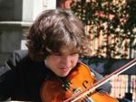 Members of the Langley Youth Orchestra in an impromptu outdoor rehearsal in Christ Church Cathedral before their Concert inside. 